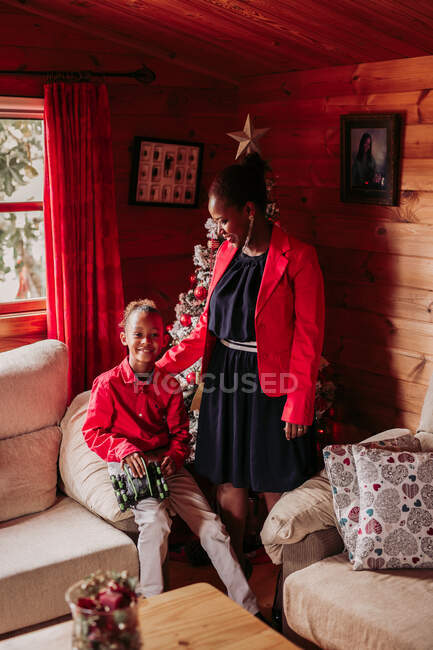 Happy woman with her daughter at home — Stock Photo