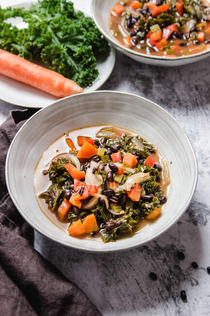 Bowls with fresh kale soup — Stock Photo