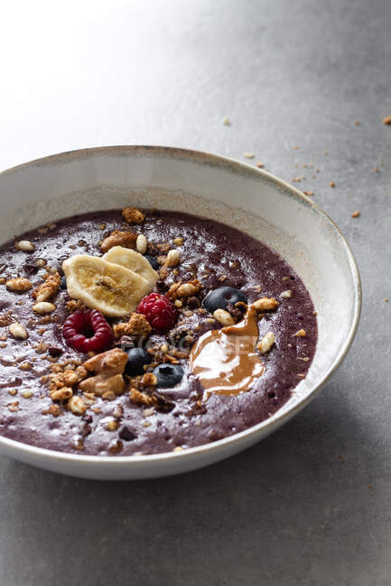 Acai bowl with granola and berries — Stock Photo