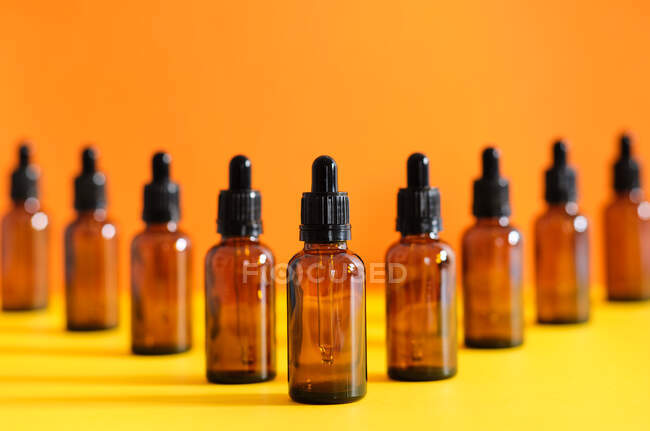 Glass vials with dropper system for medical use V composition — Stock Photo