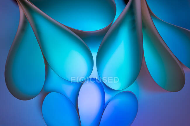 Abstract background with curled paper in colorful light — Stock Photo