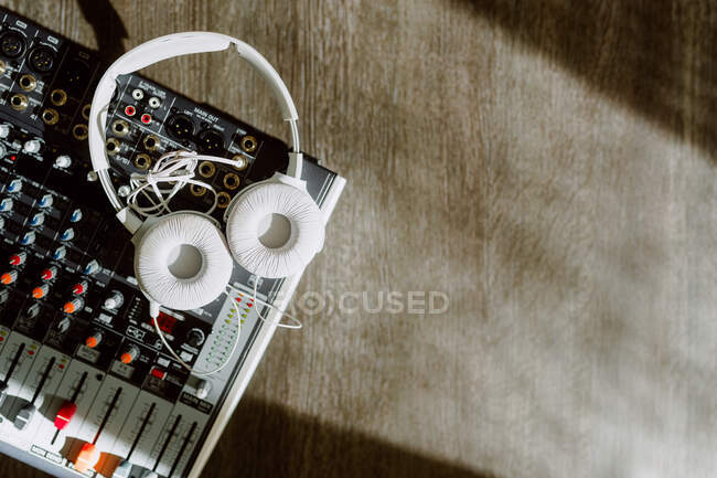 From above mixing console on table on sunlight — Stock Photo