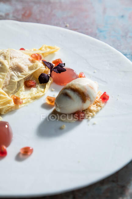 From above delicious omelet decorated with pomegranate seeds — Stock Photo