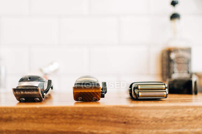 Collection of professional electric clippers in barbershop — Stock Photo