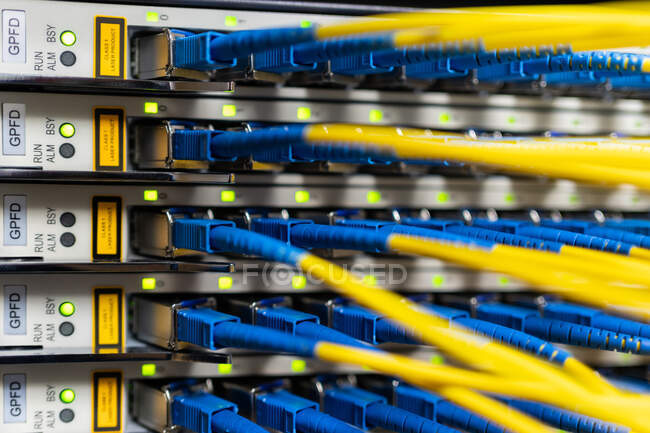 Control panel of optical fiber wires installed in communications room for providing process and network access — Stock Photo