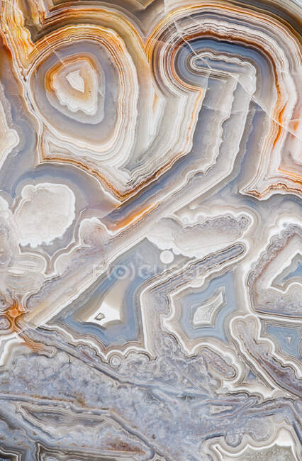 Fotografia macro do padrão de faixas em uma ágata Crazy Lace do México — Fotografia de Stock