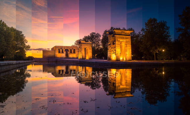 Antigo santuário egípcio refletindo em água pura sob o céu brilhante ao pôr do sol em Madrid Espanha — Fotografia de Stock