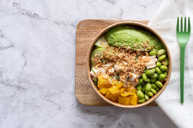 From above of delicious homemade poke served on wooden board on table — Stock Photo