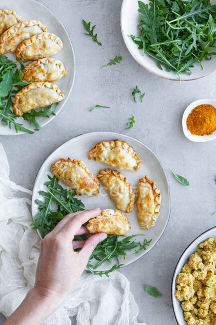 Top view of delicious plate of chicken curry turnovers — Stock Photo
