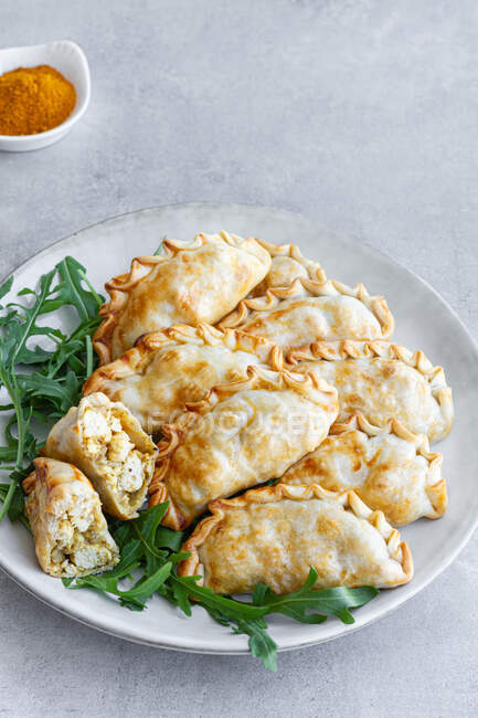 Top view of delicious plate of chicken curry turnovers — Stock Photo