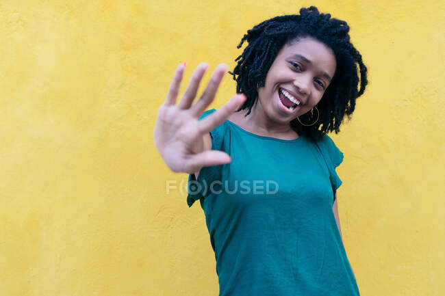 Portrait of young woman dancing outdoors — Stock Photo
