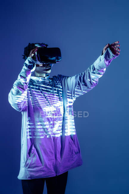 Portrait Of Young African Woman with augmented reality glasses and Modern Sportswear — Stock Photo