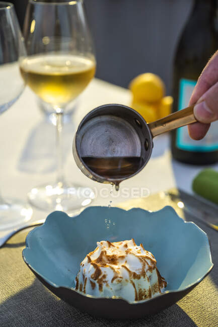 Delicious flambe lemon cake desert at outdoor high cuisine restaurant — Stock Photo