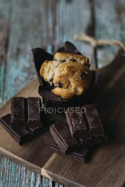 Homemade muffin with different dark chocolate bars — Stock Photo