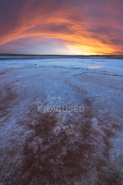 Scenic view of salty lagoon located near sea in Penahueca under sundown sky — Stock Photo