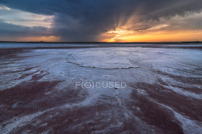 Scenic view of salty lagoon located near sea in Penahueca under sundown sky — Stock Photo