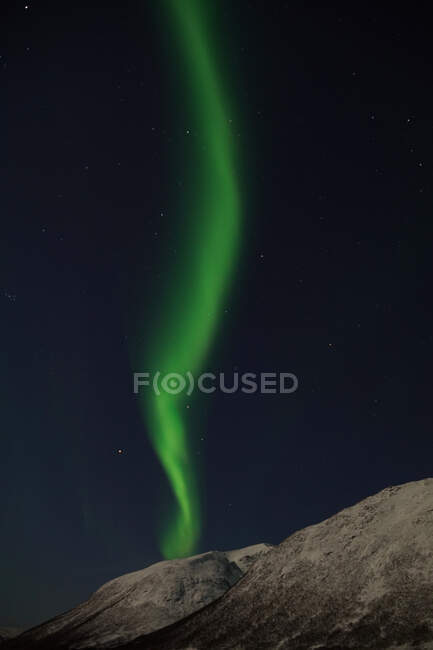 Luzes verdes e rosa espetaculares do norte em Tromso — Fotografia de Stock