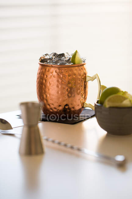 Moscow mule cocktail in copper jar — Stock Photo