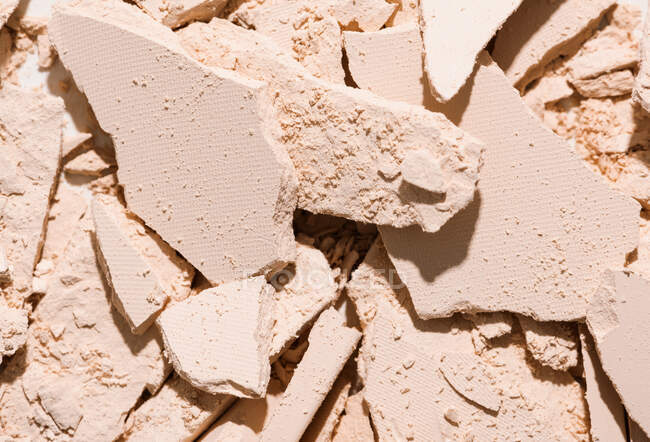 Top view close-up of a makeup broken into pieces — Stock Photo