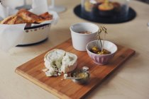 Italian aperitif on cutting board — Stock Photo