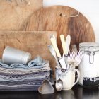 Kitchen utensils on table — Stock Photo