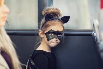 Girl in bat costume — Stock Photo