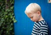 Boy looking down — Stock Photo