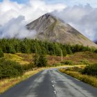 Isle of Skye Road among plain towards mountains — Stock Photo