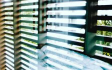 Hotel room with blinds — Stock Photo
