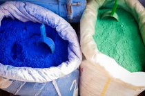 Colored powders for textile dyes on streets — Stock Photo