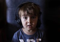 Boy listening music — Stock Photo