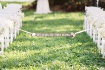 Wedding banner attached to white ribbon — Stock Photo