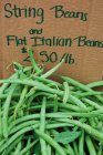 Runner beans with price tag — Stock Photo