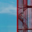 Red metal staircase — Stock Photo