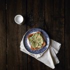 Avocado toast breakfast with salt pot — Stock Photo