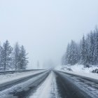 Snow covered road — Stock Photo