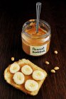 Peanut butter and toast with banana — Stock Photo