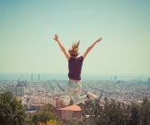 Woman jumping in air — Stock Photo