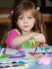 Girl painting with watercolors — Stock Photo