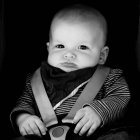 Little baby boy sitting in car seat — Stock Photo