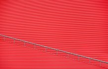 Muster der roten Kreisbogenwand — Stockfoto