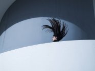 Young woman throwing her head back — Stock Photo