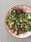 Salad roasted broccoli and pomegranate — Stock Photo