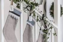 Christmas stockings with homemade nametags — Stock Photo