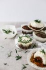 Chocolate muffins with rosemary — Stock Photo