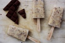 Chocolate and chocolate ice lollies — Stock Photo