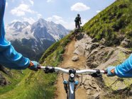 Men mountain biking — Stock Photo