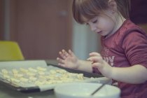 Girl baking at home — Stock Photo