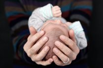Father holding newborn baby boy — Stock Photo