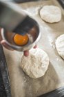 Rerson baking bread rolls — Stock Photo